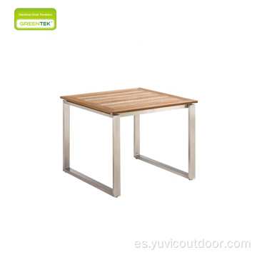 Mesa de comedor de panel de teca de marco de acero inoxidable simple